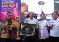 Pj Bupati Langkat Faisal Hasrimy Terima Paritrana Award 2024