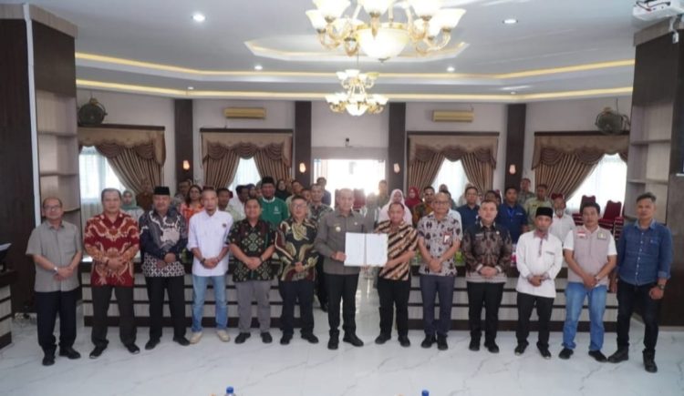 Pj Bupati Langkat Komit Wujudkan Standar Pelayanan Prima dan Akuntabel