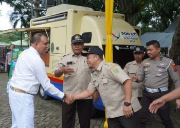 Pj Bupati Faisal Hasrimy Tinjau Proses Pembayaran Pajak Kendaraan Dinas Pemkab Langkat