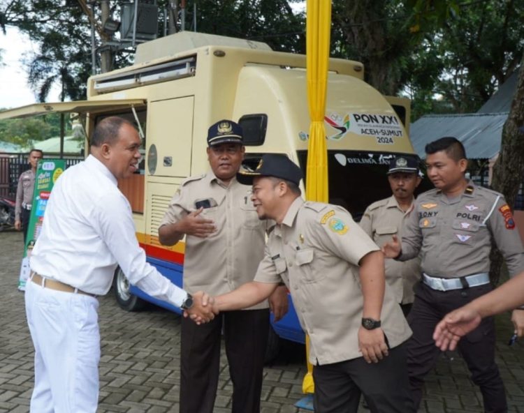 Pj Bupati Faisal Hasrimy Tinjau Proses Pembayaran Pajak Kendaraan Dinas Pemkab Langkat