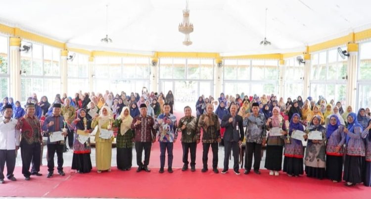 Pj Bupati Langkat Dorong Guru Jadi Pemimpin Inspiratif di Seminar Hari Guru ke-79
